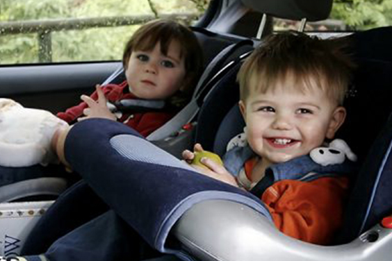 two babies in car seat