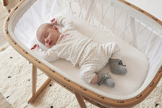 Baby sleeping in a cradle
